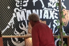 Greg Upfold an axe throwing participant at MANIAX.